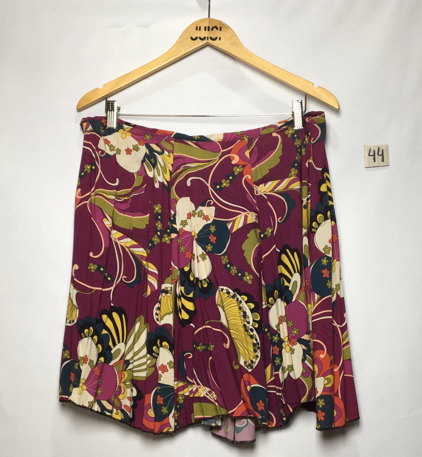 SAIA ESTAMPADA FUNDO ROXO FLORAL PSICO CURTA