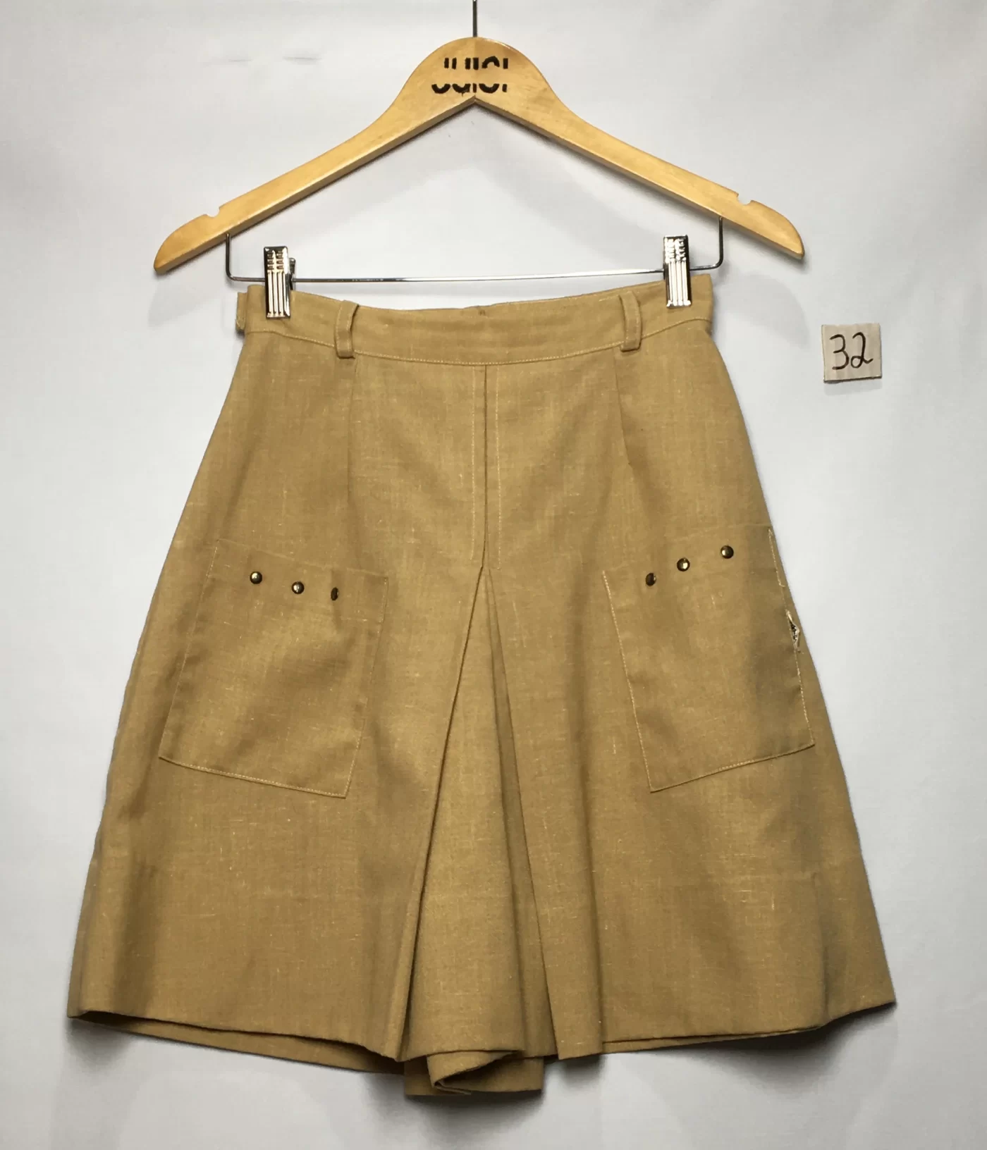 SAIA FENDA FRONTAL CAQUI BOLSOS ILHÓS