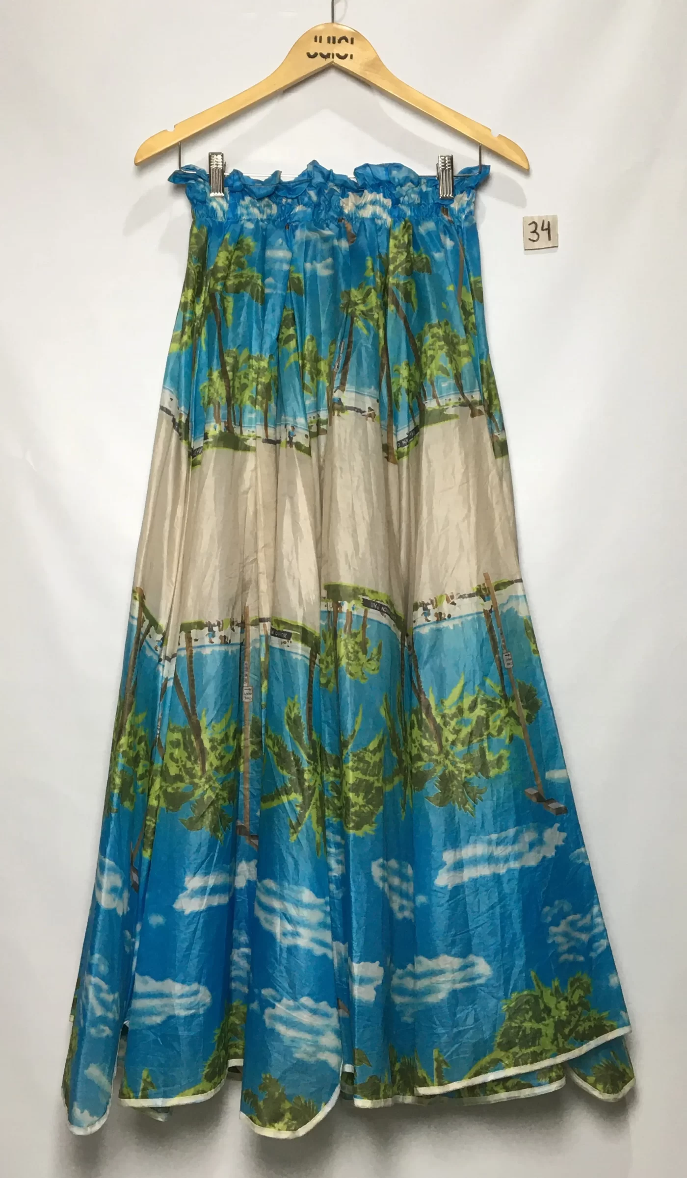SAIA ESTAMPADA COM PAISAGEM TROPICAL TECIDO GUARDA CHUVA