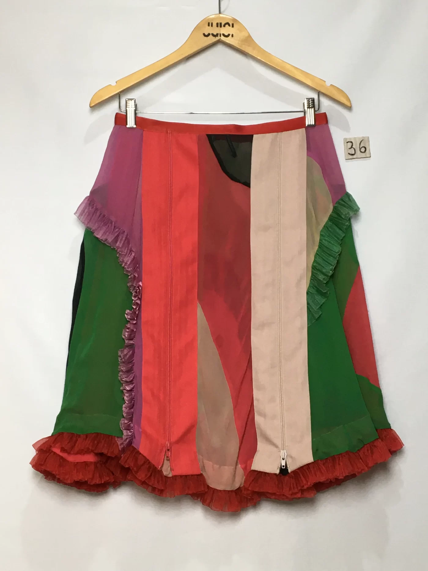 SAIA MULTICOLORIDA COM DETALHES EM ZIPER E BABADOS