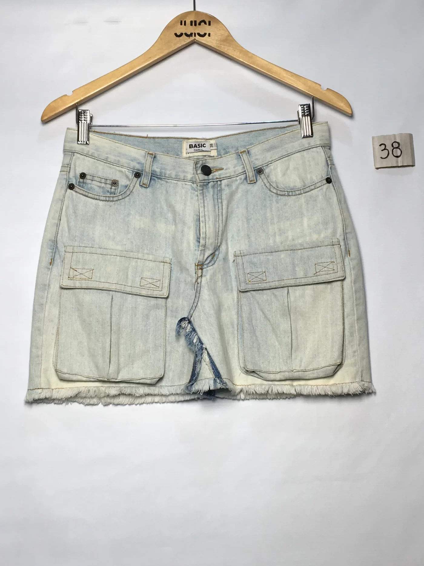 MINISSAIA JEANS CLARO COM DOIS BOLSOS FRONTAIS