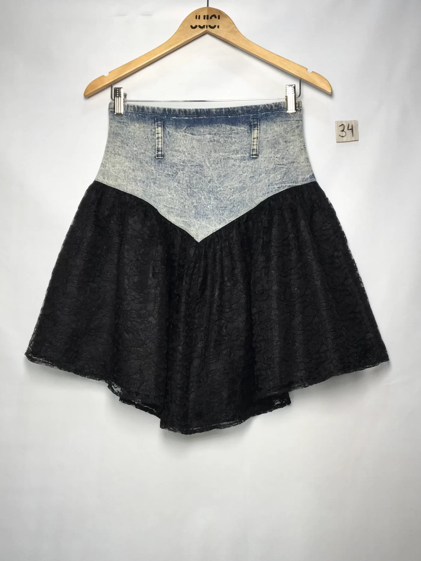 SAIA RENDA PRETA CÓS JEANS PASSANTE