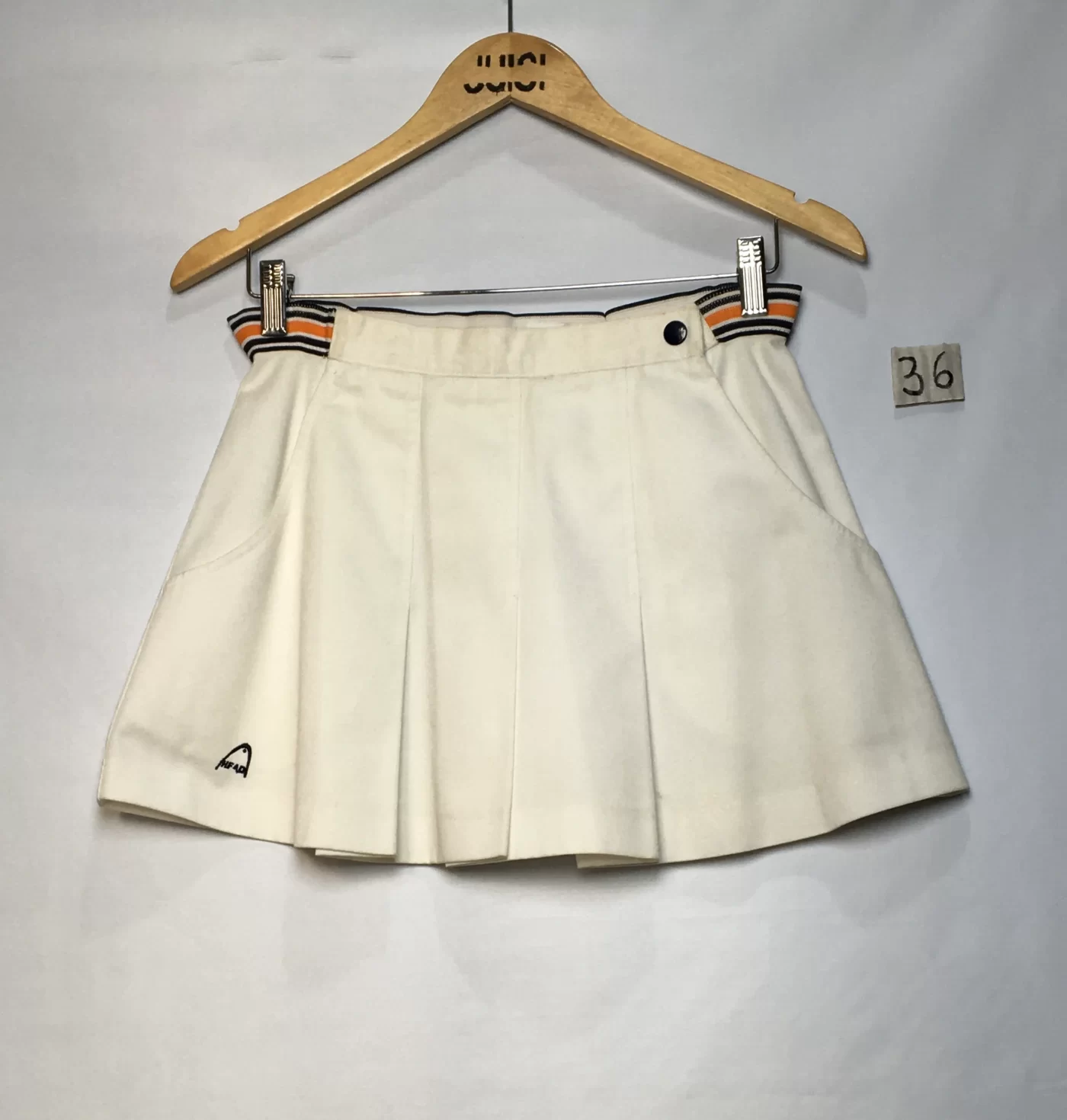 SAIA MINI BRANCA CÓS FAIXA LATERAL LISTRAS