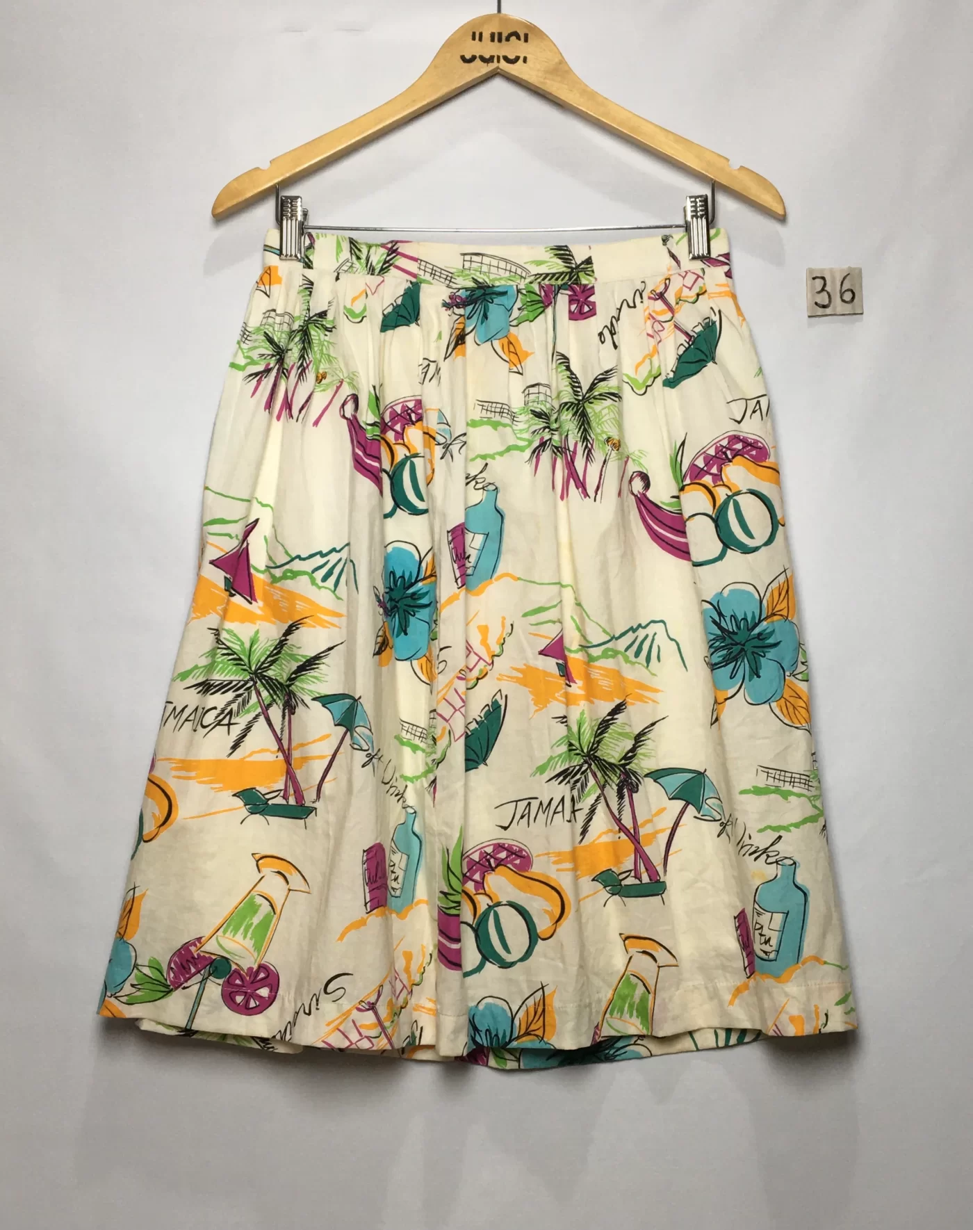 SAIA ESTAMPADA JAMAICA FUNDO CREME ALGODÃO