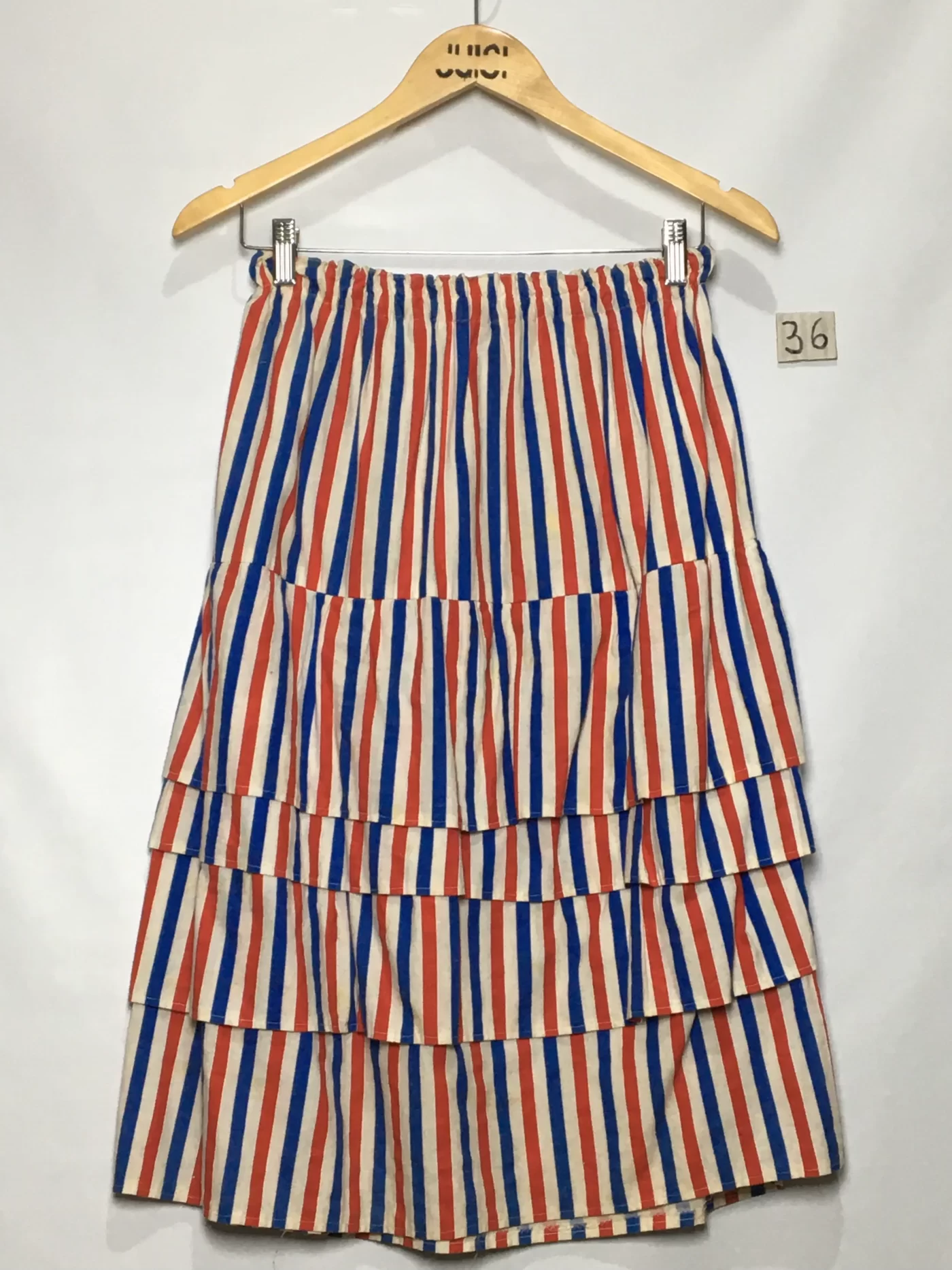 SAIA MIDI LISTRADA EM CAMADAS AZUL, VERMELHA E BRANCA